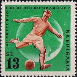 Colnect-1668-945-Soccer-Player-in-Front-of-a-Globe.jpg