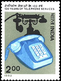 Colnect-2523-604-Telephone-Services--Early-and-modern-telephone.jpg