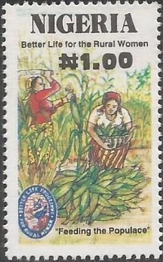 Colnect-3682-082-Women-harvesting-corn.jpg