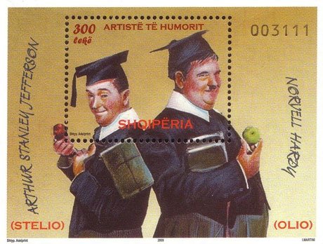 Colnect-609-970-Laurel-and-Hardy-wearing-mortarboards.jpg
