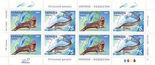 Colnect-1451-266-Caspian-Seal-Phoca-caspica-Black-Sea-Beluga-Huso-huso-po-back.jpg