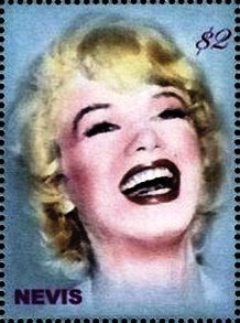 Colnect-5162-553-Marilyn-Monroe-laughing-with-head-tilted-back.jpg