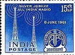 Colnect-470-529-Silver-Jubilee-All-India-Radio---Radio-Masts-and-Emblem.jpg