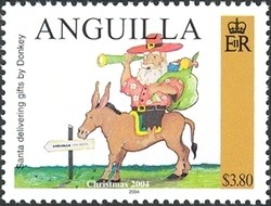 Colnect-1365-796-Christmas---Santa-delivering-gifts-by-Donkey.jpg