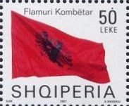Colnect-1533-620-Albanian-flag-blowing-in-wind.jpg