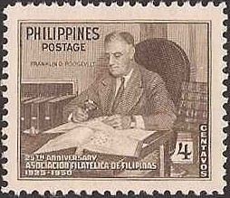 Colnect-1508-885-Franklin-D-Roosevelt-with-stamp-collection.jpg
