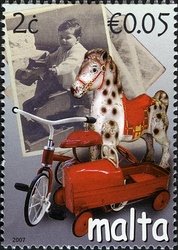 Colnect-657-692-Rocking-horse-tricycle---car-by-Triang-1950s.jpg