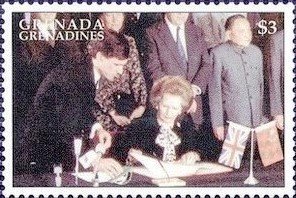 Colnect-4385-362-Margaret-Thatcher-signing-joint-declaration-1984.jpg