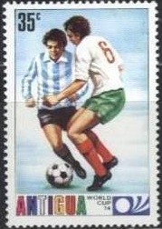 Colnect-1775-437-Games-rsquo--emblem-and-soccer.jpg