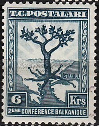 Colnect-985-313-Olive-Tree-with-Roots-Extending-to-All-Balkan--Capitals.jpg