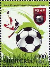 Colnect-3014-464-Federation-emblem-football-and-player-making-scissor-kick.jpg