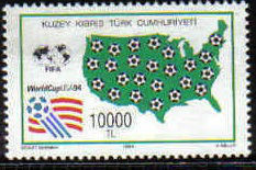 Colnect-1178-972-Map-of-the-USA-with-footballs-FIFA--amp--Wm-badges.jpg