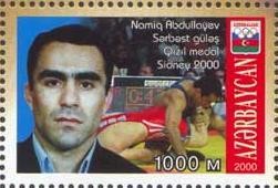 Colnect-1097-724-Namig-Abdullayev-wrestle-free-style-gold-medal.jpg