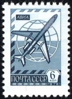 Colnect-2090-323-Globe-and-jetliner-Tu-154.jpg