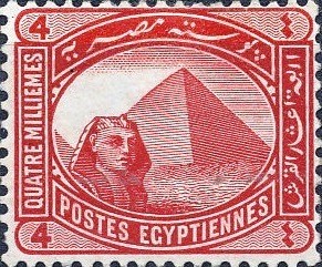 Colnect-1281-541-Sphinx-in-front-of-Cheops-pyramid.jpg