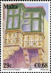 Colnect-657-687-Carved-stone-balcony-with-glazed-timber-enclosure-Gozo.jpg