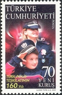 Colnect-957-778-Child-and-Woman-in-Police-Uniform.jpg