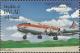 Colnect-5136-066-Douglas-DC-4-landing-at-Airai-Village.jpg