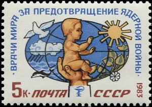 Colnect-5113-727-Hand-holding-baby-on-the-background-of-globe.jpg