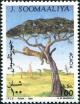 Colnect-4947-848-Cheetah-in-an-Acacia-Tree.jpg
