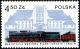 Colnect-1998-518-Ty51-coal-train-and-Gdynia-Station-1933.jpg