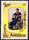 Colnect-2206-750-Man-in-wheelchair.jpg