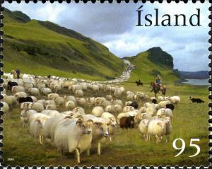 Colnect-5950-617-Shepherds-and-sheep-in-open-pasture.jpg