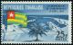 Colnect-5138-105-Lom%C3%A9-Harbor-and-Togolese-flag.jpg