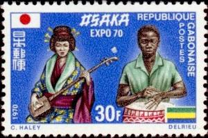 Colnect-2526-938-Geisha-and-african-drummer.jpg