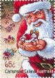 Colnect-2737-566-Santa-holding-a-Red-Crab.jpg