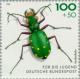 Colnect-153-925-Green-Tiger-Beetle-Cicindela-campestris.jpg