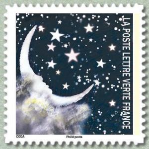 Colnect-3589-980-Planetary-correspondences----Crescent-moon-looking-at-stars-.jpg