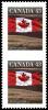 Colnect-3187-877-Canadian-Flag-over-Field.jpg