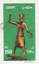 Colnect-1101-464-Gilded-wood-figurine-of-Tutankhamun.jpg