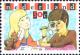 Colnect-2213-695-Girl-and-boy-with-stamp-album.jpg