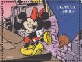 Colnect-6051-605-Mickey-Minnie-embracing-on-top-of-skyscraper.jpg