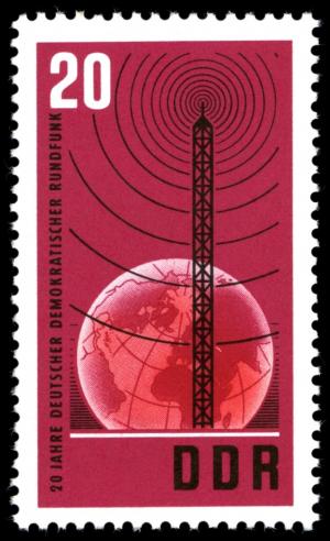 Colnect-1974-597-Transmitter-mast-in-front-of-globe.jpg