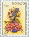 Colnect-149-319-Bouquet-of-roses-iris-fuchsias-and-petunias.jpg