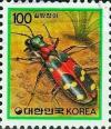 Colnect-2782-484-Tiger-Beetle-Cicindela-chinensis.jpg