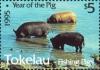 Colnect-4596-370-Year-of-the-Pig-1995---Fishing-pigs.jpg
