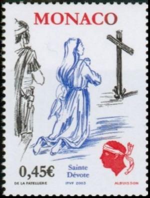 Colnect-1098-187-Saint-Devote-prays-in-front-of-a-cross.jpg