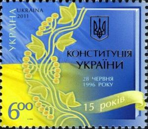 Colnect-944-516-Constitution-of-Ukraine-Branch-on-the-background-of-nationa.jpg