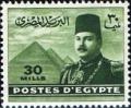 Colnect-1279-869-King-Farouk-in-front-of-the-Pyramids-of-Gizeh.jpg