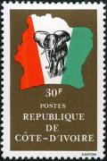 Colnect-3704-178-Elephant-in-front-of-map-of-Ivory-Coast.jpg