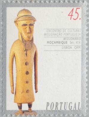 Colnect-179-233-Carving-of-missionary-Mozambique.jpg