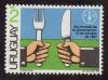 Colnect-1440-494-Hands-holding-fork-and-knive-FAO-Emblem.jpg