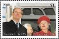 Colnect-5145-728-Queen-Elizabeth-wearing-red-hat-and-coat-with-Prince-Philip.jpg