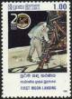 Colnect-2420-951-1st-moon-landing---Astronaut-descending-ladder.jpg