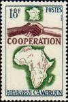 Colnect-2705-038-Hand-Shake-and-Map-of-Africa.jpg