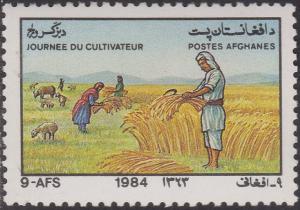 Colnect-1440-456-Harvesting-wheat-Sheep-Ovis-ammon-aries.jpg